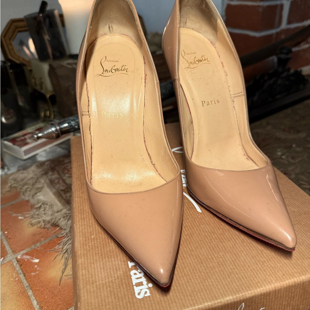 Christian Louboutin Nude Heels with Signature Red Sole